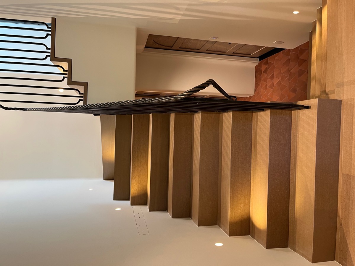 Oak staircase with wrought iron railing