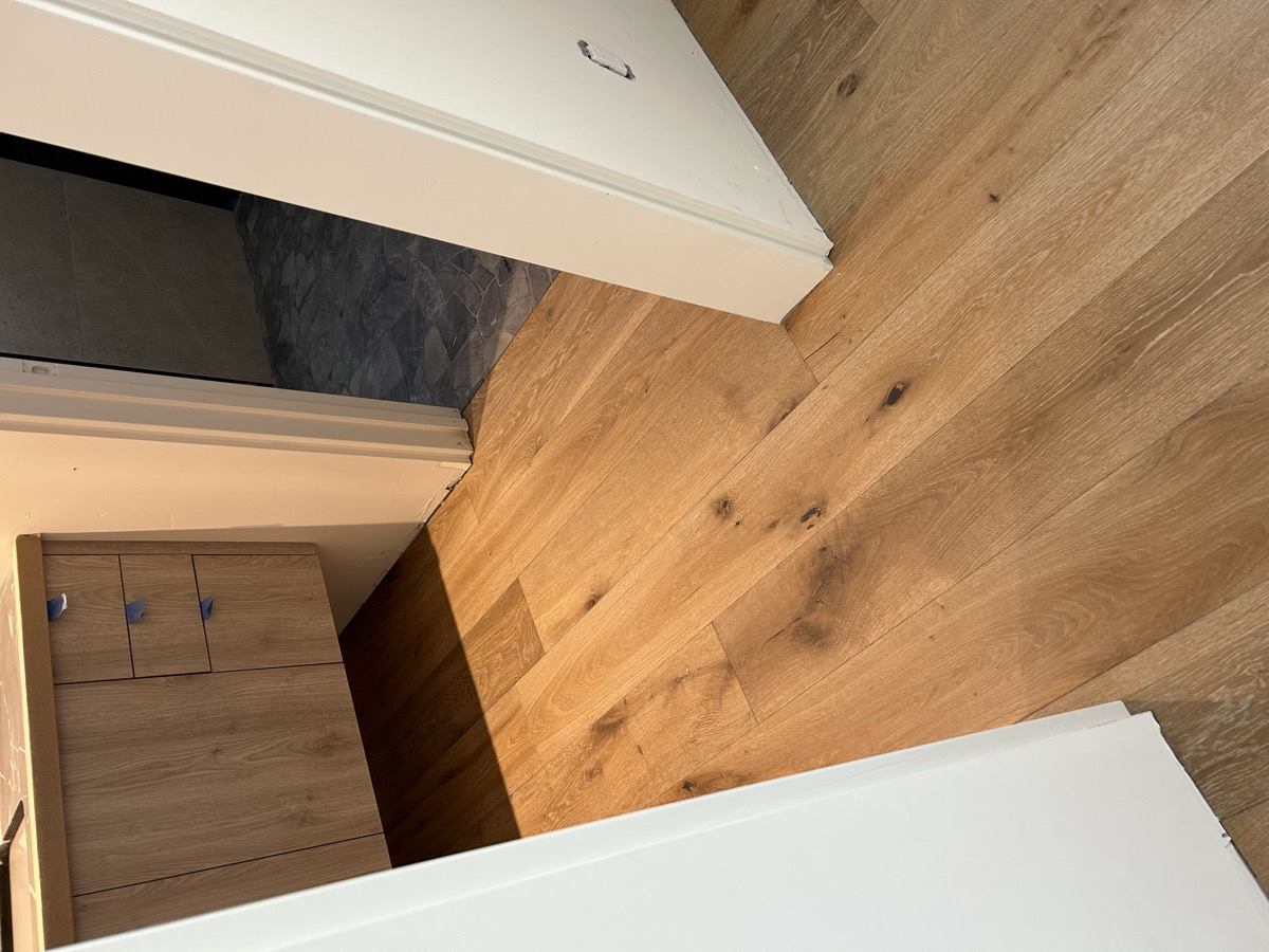 White oak flooring flowing between rooms